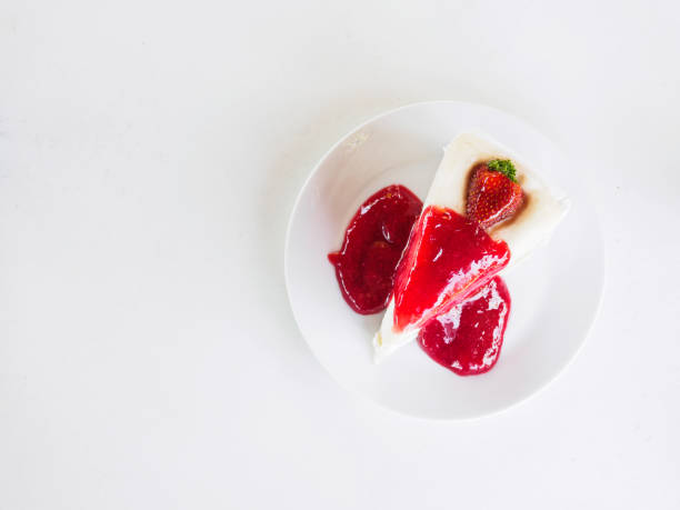 istock Top view crape cake with strawberry jam on white plate 641339676