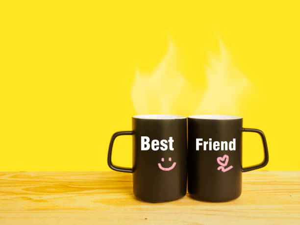 istock best friend message on couple coffee or tea cup on desk 641339726