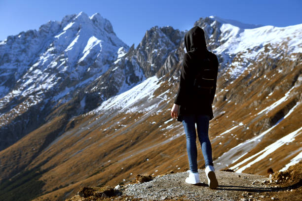 istock Freedom. Woman looking on mountains. 641340284