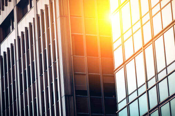 istock Modern commercial building with sun ray reflection in window 641340286