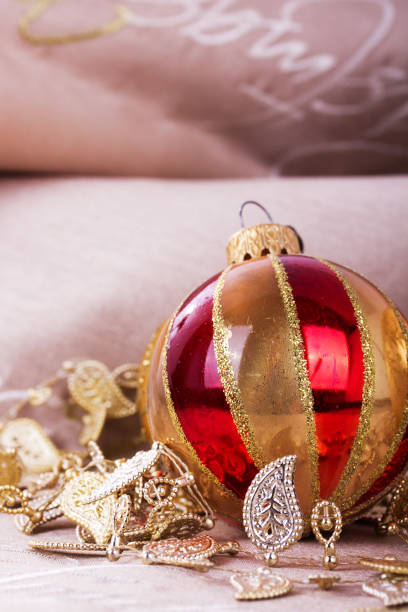 istock Festive gold Christmas decorations on fabric background 641341806