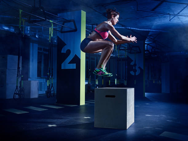 istock gym: Female athlete in action 641344624