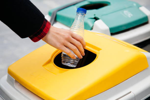 Recycling plastic in the street