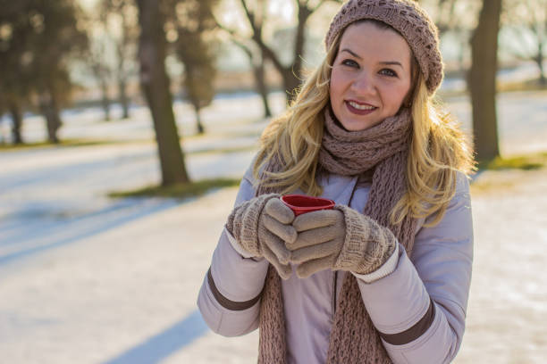 istock Woman holding a cup of tea 641349724