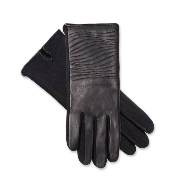 istock Black women's leather  gloves isolated on white 641349876