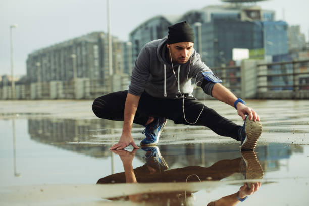 istock Photo of a man stretching before exercise 641350930