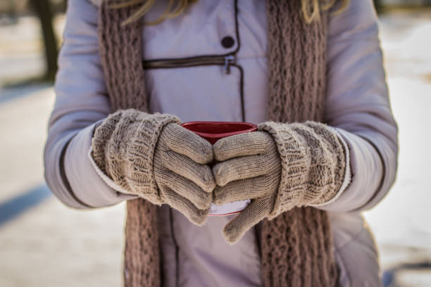 istock Woman holding a cup of tea 641352230