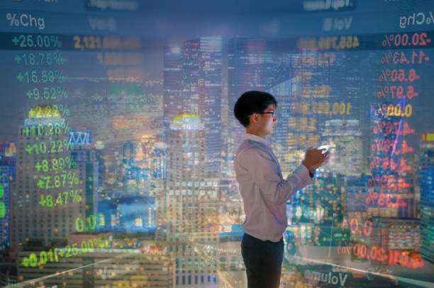 istock Young business man using smart phone analysis stockmarket 641353874