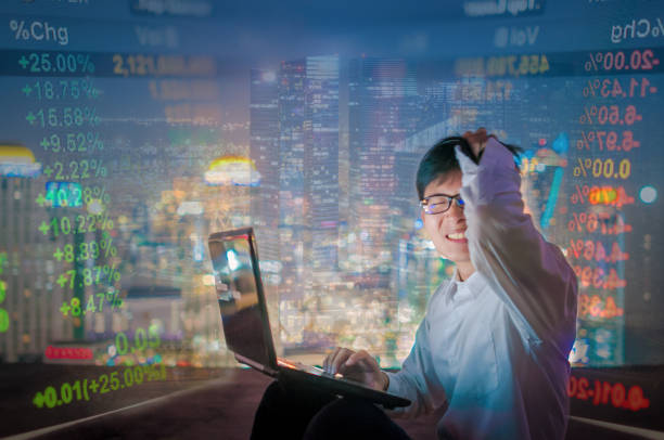 istock Young business man using laptop cityscape background 641353946