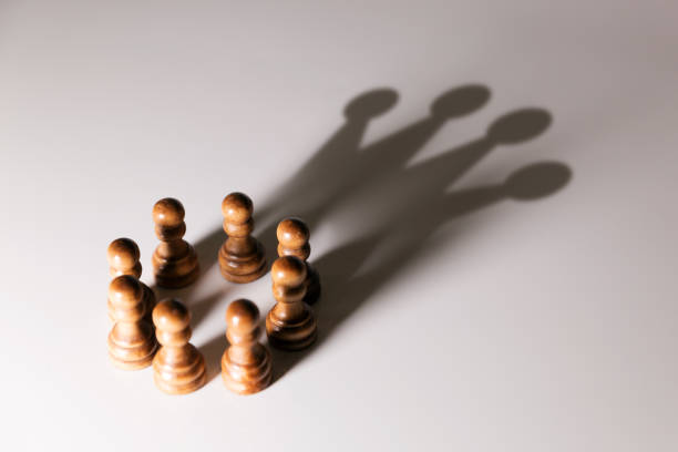 business leadership, teamwork power and confidence concept business leadership, teamwork power and confidence concept pawn chess piece photos stock pictures, royalty-free photos & images