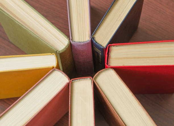 istock stack of colorful books in a library 641357120