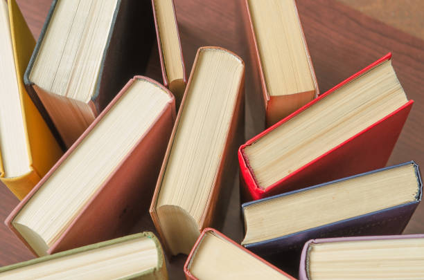 istock stack of colorful books in a library 641357126