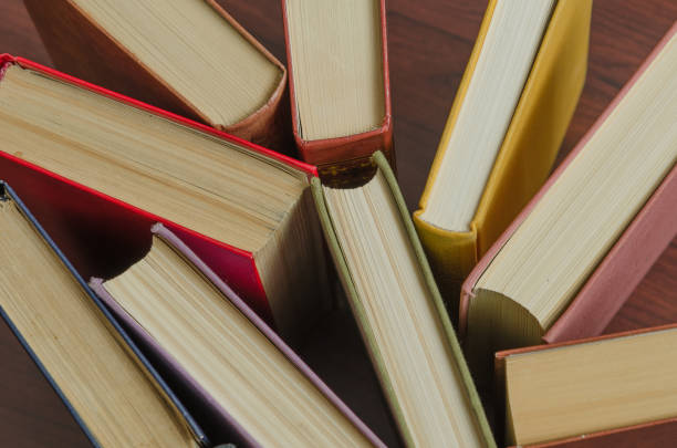 istock stack of colorful books in a library 641357142