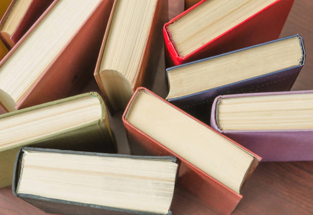 istock stack of colorful books in a library 641357150