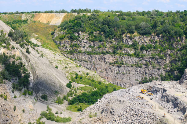 istock Extraction of mineral resources in the granite quarry 641358420