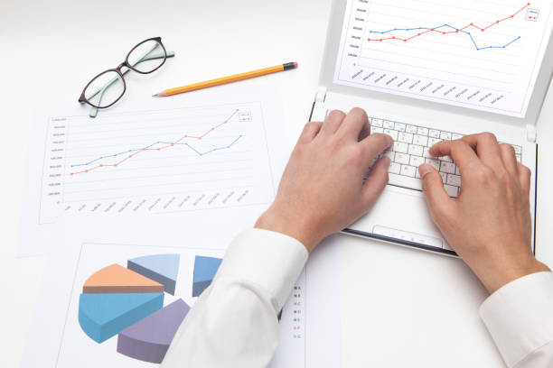 istock businessman work in office with supplies on white backgrounds 641358462