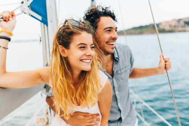 Couple sailing on a yacht