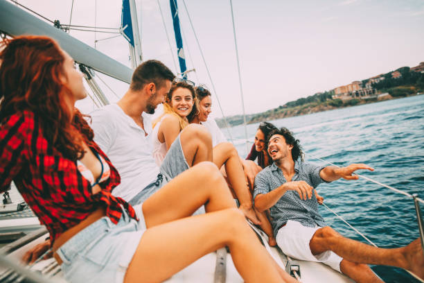 istock Happy friends on a yacht 641360142