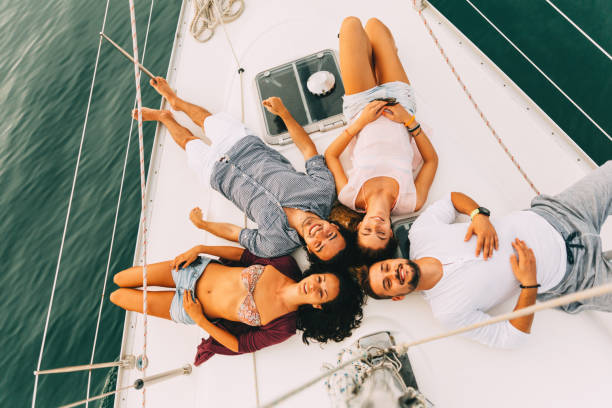 istock Friends lying on a yacht 641360164