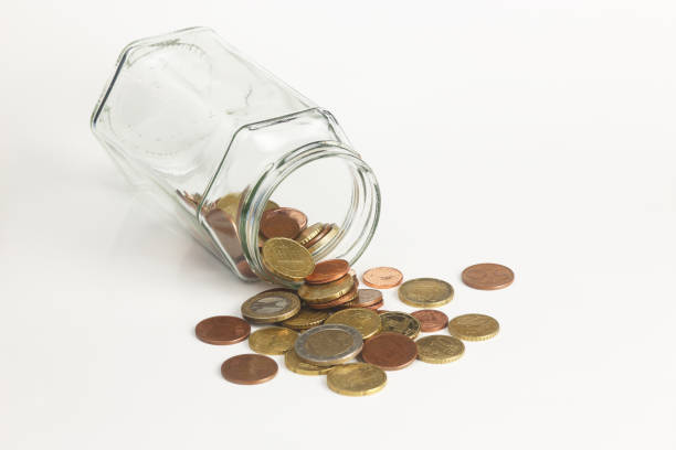 istock Coins in a jar 641360172