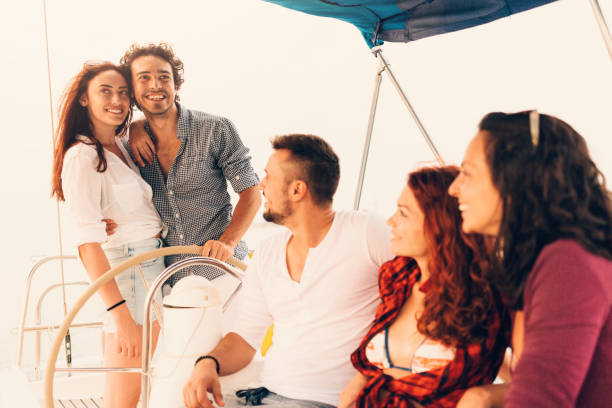 istock Happy friends on a yacht 641360186