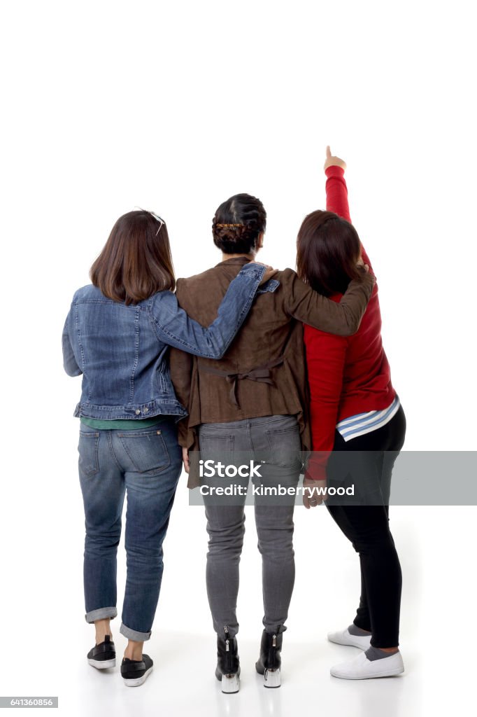 Friends The Asian women on the white background. Rear View Stock Photo