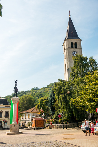 Tokaj, Hungary - 21 august 2016: tourists in front of Jézus szíve church and the statue of Saint Stephen