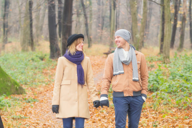 istock Young couple hanging out in park. 641365596