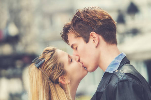 Couple enjoying outdoors. Couple enjoying outdoors. kissing on the mouth stock pictures, royalty-free photos & images