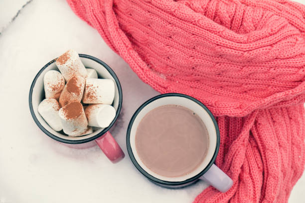 istock Hot chocolate with marshmallow in pink cups 641366264