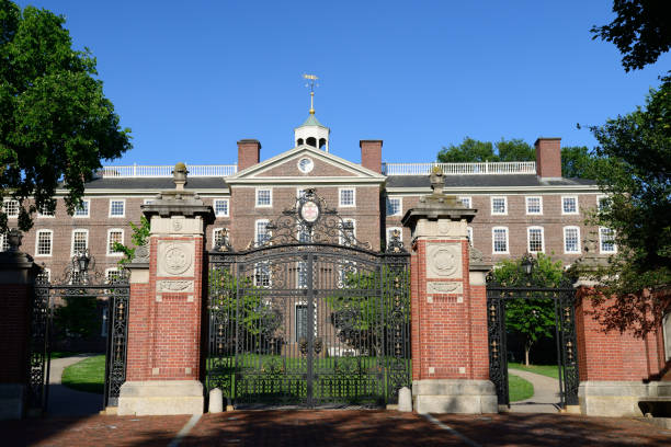 Gate to Campus of Brown University Providence, USA - June 25, 2016. Gate in the campus of Brown University. Brown University is located atop College Hill in Providence, the capital city of Rhode Island State. Founded in 1764, it is one of the most prestigious ivy league universities in the United States and famous for its liberal choice of curriculum and quality of teaching. brown university stock pictures, royalty-free photos & images