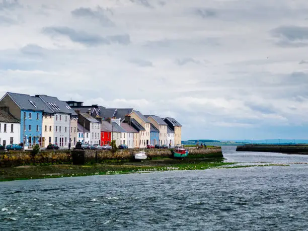 View of small port of Galway with the typical houses in background