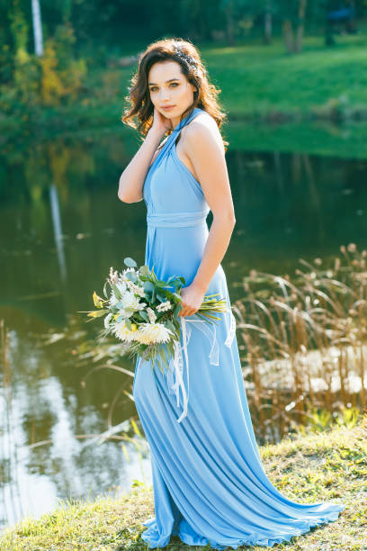 istock Beautiful young bridesmaid with curly hair 641370008