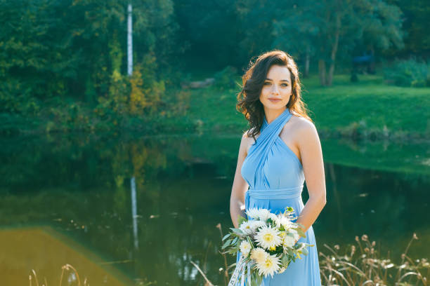 istock Beautiful young bridesmaid with curly hair 641370854