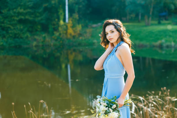 istock Beautiful young bridesmaid with curly hair 641371488