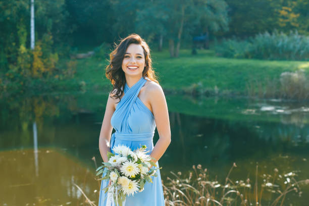 istock Beautiful young bridesmaid with curly hair 641371746