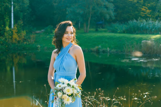 istock Beautiful young bridesmaid with curly hair 641371898