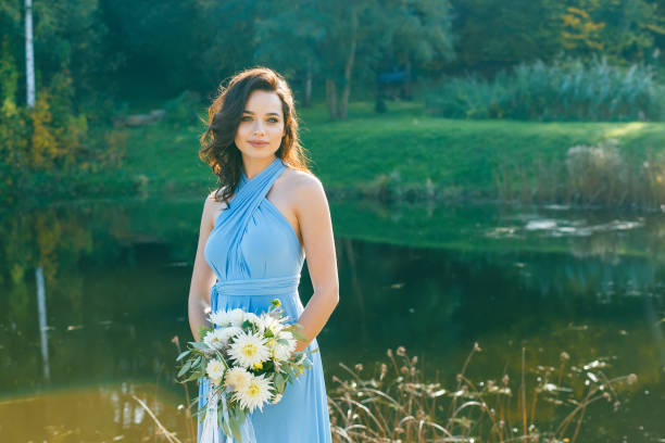istock Beautiful young bridesmaid with curly hair 641372144