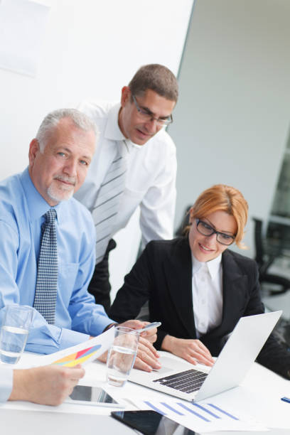 istock Business people analyzing market research statistics 641372212
