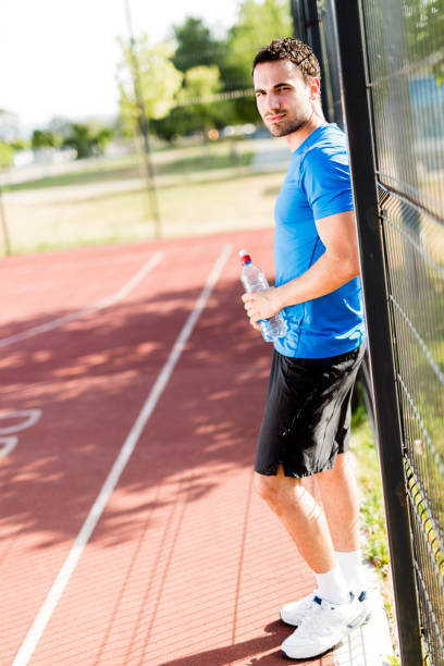 istock Young athlete taking a break on a hot summer day 641372948