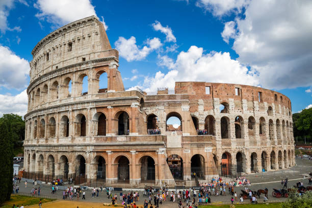 istock Colosseum with clear blue sky and clouds, Rome. Panorama 641373026