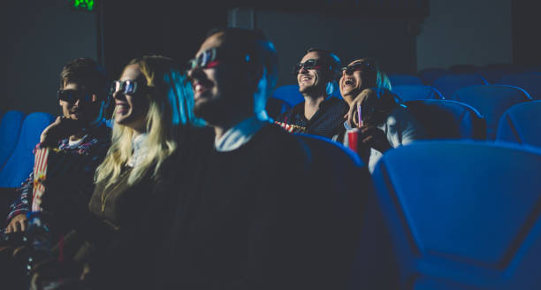 istock People in cinema smiling 641375904
