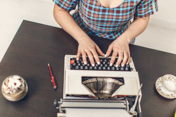 istock Pin Up girl with typewriter 641377376