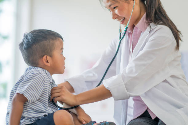 istock Listening to a Child's Heartbeat 641377832