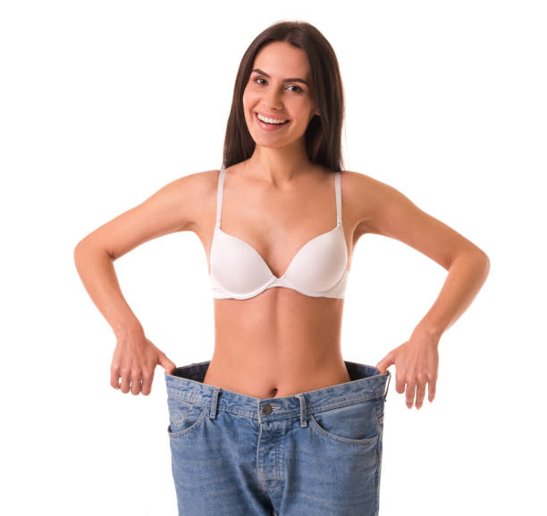 istock Girl showing weight loss 641380300