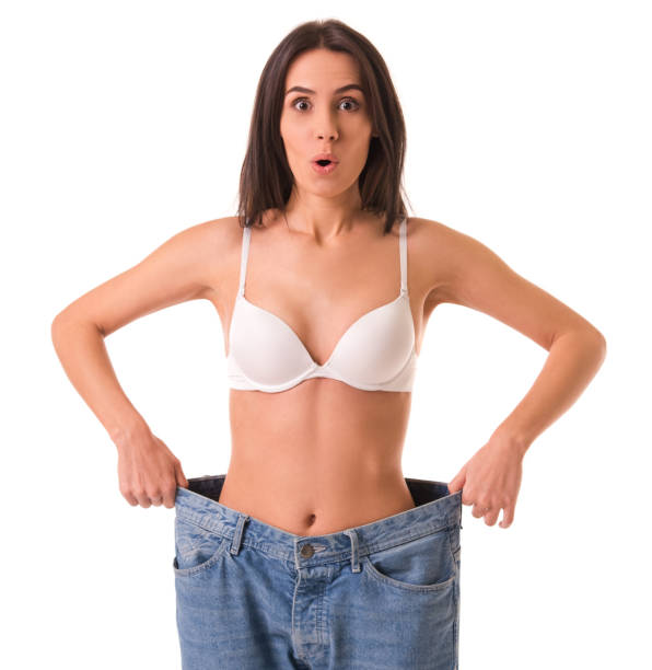 istock Girl showing weight loss 641381716