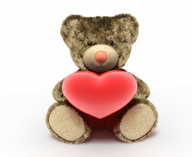 istock Toy teddy bear with red heart 641382090