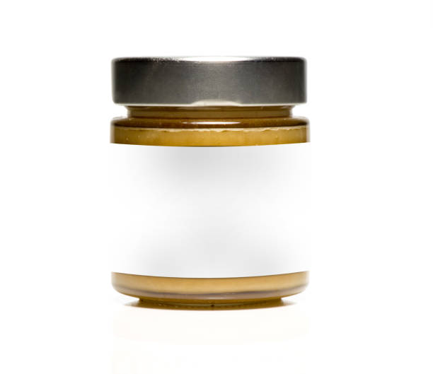 istock Transparent jar of liquid honey 641382648