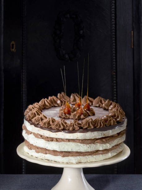 istock Meringue chocolate hazelnut cake with caramel decoration 641386274