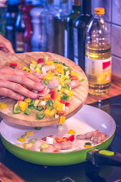 istock Preparing Fish Tortilla Sandwich with Vegetables 641387396